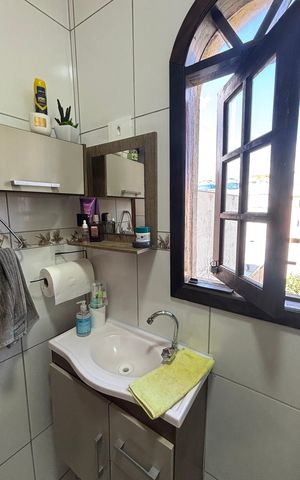 Casa à venda com 119m², 2 quartos e 2 vagas Casa à venda com 119m², 2 quartos e 2 vagasBanheiro da Suíte 2