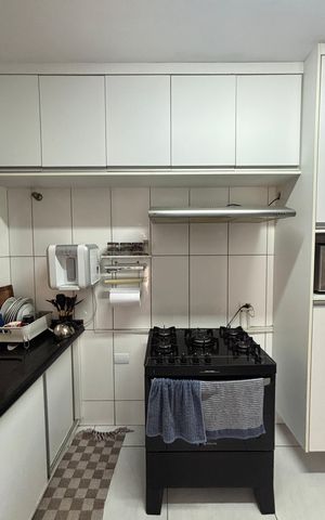 Casa à venda com 119m², 2 quartos e 2 vagas Casa à venda com 119m², 2 quartos e 2 vagasCozinha