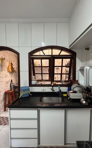 Casa à venda com 119m², 2 quartos e 2 vagas Casa à venda com 119m², 2 quartos e 2 vagasCozinha