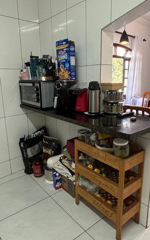 Casa à venda com 119m², 2 quartos e 2 vagas Casa à venda com 119m², 2 quartos e 2 vagasCozinha
