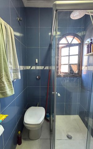 Casa à venda com 119m², 2 quartos e 2 vagas Casa à venda com 119m², 2 quartos e 2 vagasBanheiro da Suíte 1