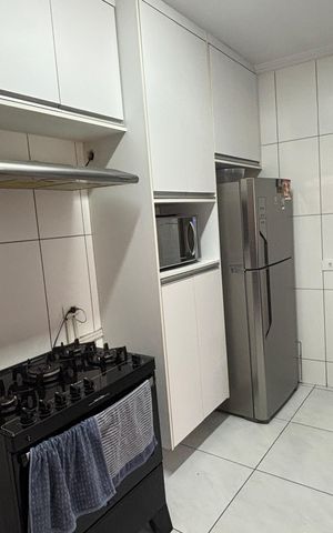 Casa à venda com 119m², 2 quartos e 2 vagas Casa à venda com 119m², 2 quartos e 2 vagasCozinha