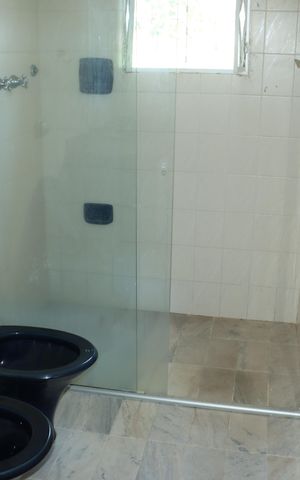 Casa de condomínio para alugar com 591m², 7 quartos e 4 vagasBanheiro da Suíte 3