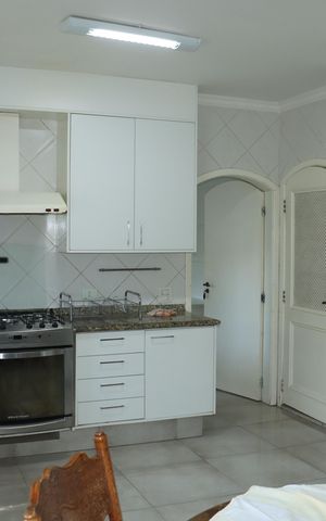 Casa de condomínio para alugar com 591m², 7 quartos e 4 vagasCozinha