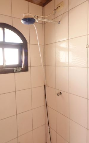 Casa à venda com 311m², 5 quartos e 2 vagasBanheiro 4