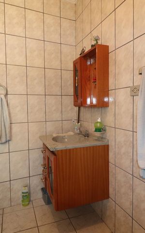Casa à venda com 116m², 3 quartos e 2 vagasBanheiro 2
