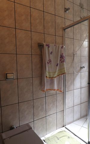 Casa à venda com 116m², 3 quartos e 2 vagasBanheiro Quarto 1 suíte