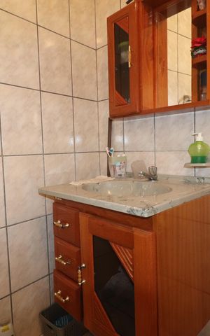 Casa à venda com 116m², 3 quartos e 2 vagasBanheiro 2