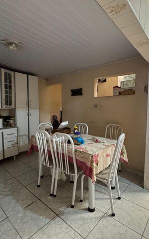 Casa à venda com 150m², 3 quartos e 1 vaga Casa à venda com 150m², 3 quartos e 1 vagaCozinha