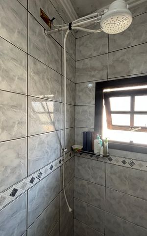 Casa à venda com 220m², 3 quartos e 2 vagas Casa à venda com 220m², 3 quartos e 2 vagasBanheiro