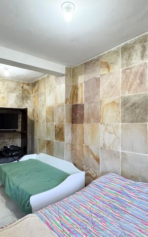 Casa à venda com 497m², 4 quartos e 2 vagasSuíte 1