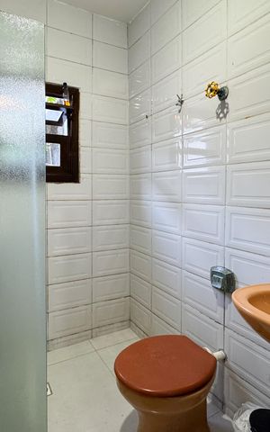 Casa à venda com 497m², 4 quartos e 2 vagasBanheiro - Suíte 1