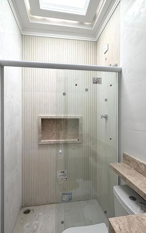 Casa à venda com 150m², 3 quartos e 2 vagas Casa à venda com 150m², 3 quartos e 2 vagasBanheiro da Suíte 1