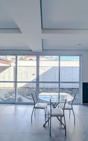 Casa de condomínio à venda com 83m², 2 quartos e 2 vagasÁrea comum - Salão de festas