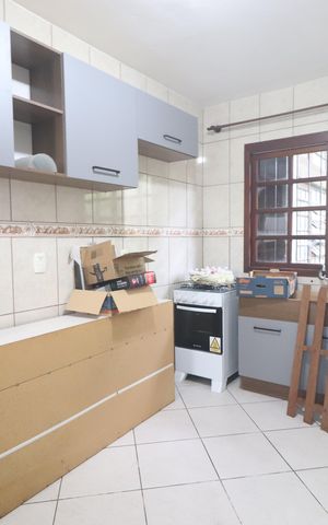 Casa à venda com 200m², 4 quartos e 3 vagasCozinha da casa dos fundos