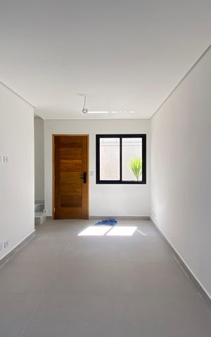 Casa de condomínio à venda com 70m², 2 quartos e 2 vagas Casa de condomínio à venda com 70m², 2 quartos e 2 vagasSala - Cozinha