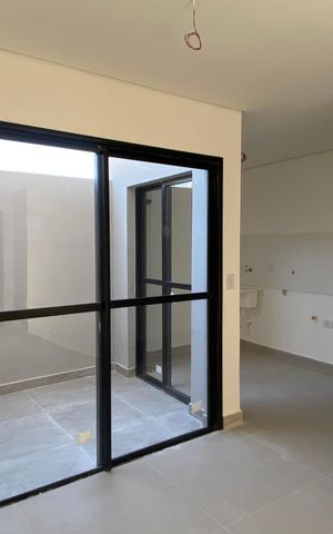 Casa de condomínio à venda com 70m², 2 quartos e 2 vagas Casa de condomínio à venda com 70m², 2 quartos e 2 vagasSala - Cozinha