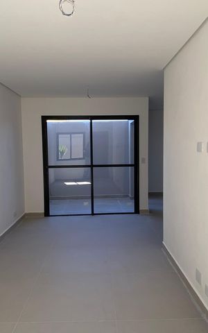 Casa de condomínio à venda com 70m², 2 quartos e 2 vagas Casa de condomínio à venda com 70m², 2 quartos e 2 vagasSala - Cozinha