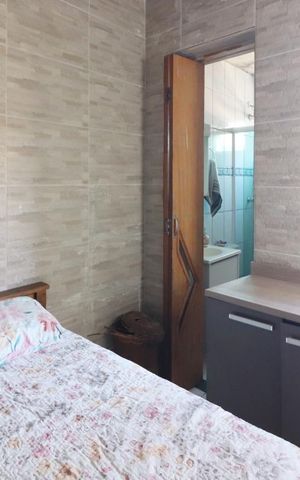 Casa à venda com 150m², 2 quartos e 2 vagasQuarto 2 - Suíte
