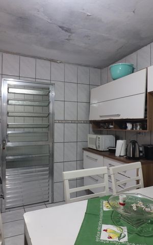 Casa à venda com 150m², 2 quartos e 2 vagasCozinha 