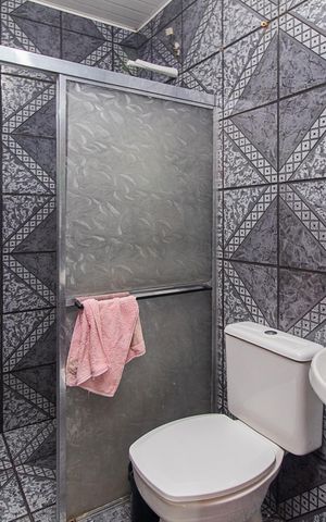 Casa à venda com 195m², 3 quartos e 2 vagasBanheiro