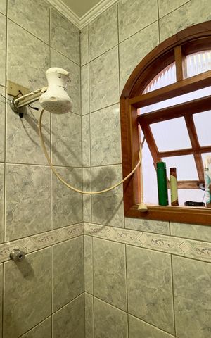 Casa à venda com 250m², 3 quartos e 2 vagas Casa à venda com 250m², 3 quartos e 2 vagasBanheiro da Suíte 2