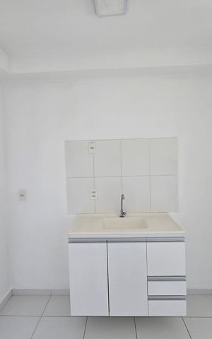 Apartamento à venda com 44m², 2 quartos e 1 vaga Apartamento à venda com 44m², 2 quartos e 1 vagaCozinha e Área de Serviço