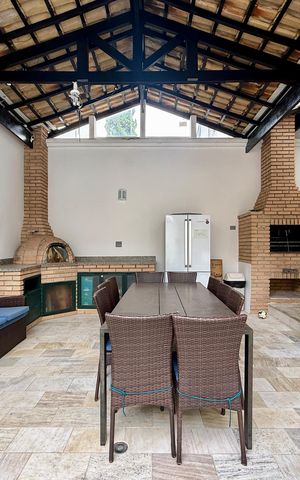 Casa de condomínio à venda com 397m², 4 quartos e 4 vagas Casa de condomínio à venda com 397m², 4 quartos e 4 vagasChurrasqueira
