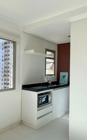 Studio à venda com 28m², 1 quarto e 1 vaga Studio à venda com 28m², 1 quarto e 1 vagaSala