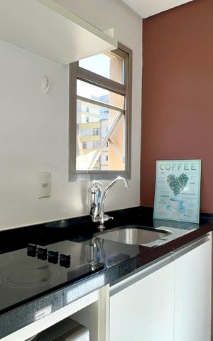 Studio à venda com 28m², 1 quarto e 1 vaga Studio à venda com 28m², 1 quarto e 1 vagaCozinha