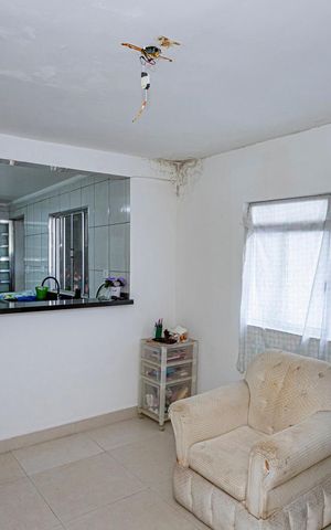 Casa à venda com 161m², 4 quartos e 2 vagas Casa à venda com 161m², 4 quartos e 2 vagasSala e cozinha - casa 2