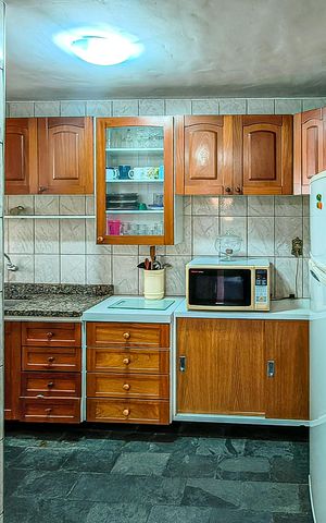Casa à venda com 105m², 4 quartos e 2 vagas Casa à venda com 105m², 4 quartos e 2 vagasCozinha