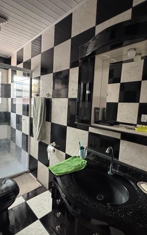 Casa à venda com 163m², 3 quartos e 2 vagasBanheiro 2 - Edícula