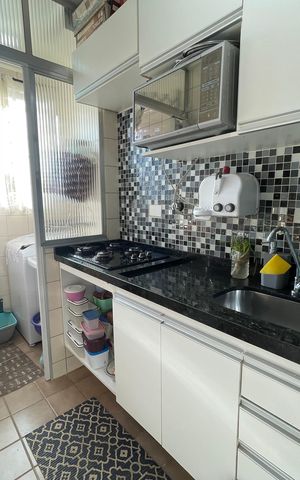 Apartamento à venda com 44m², 2 quartos e 1 vaga Apartamento à venda com 44m², 2 quartos e 1 vagaCozinha e Área de Serviço
