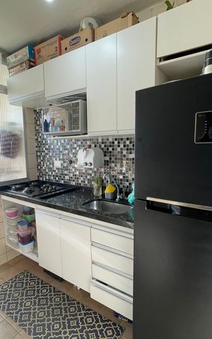 Apartamento à venda com 44m², 2 quartos e 1 vaga Apartamento à venda com 44m², 2 quartos e 1 vagaCozinha e Área de Serviço