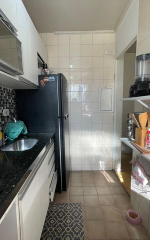 Apartamento à venda com 44m², 2 quartos e 1 vaga Apartamento à venda com 44m², 2 quartos e 1 vagaCozinha e Área de Serviço