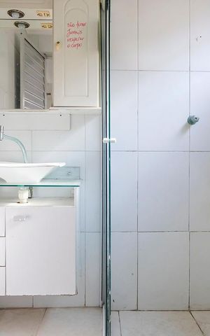 Casa à venda com 91m², 2 quartos e 2 vagasBanheiro casa 1