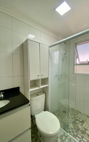 Apartamento à venda com 48m², 2 quartos e 2 vagas Apartamento à venda com 48m², 2 quartos e 2 vagasBanheiro da Suíte
