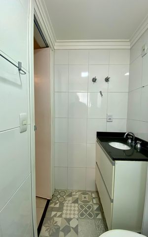 Apartamento à venda com 48m², 2 quartos e 2 vagas Apartamento à venda com 48m², 2 quartos e 2 vagasBanheiro da Suíte