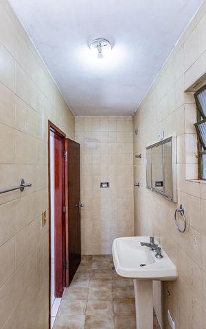 Casa à venda com 200m², 3 quartos e 2 vagas Casa à venda com 200m², 3 quartos e 2 vagasBanheiro da Suíte