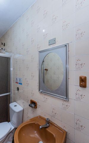 Casa à venda com 200m², 3 quartos e 2 vagas Casa à venda com 200m², 3 quartos e 2 vagasBanheiro