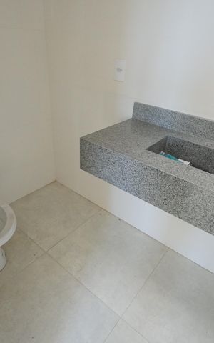 Casa à venda com 120m², 3 quartos e 2 vagasBanheiro da Suíte