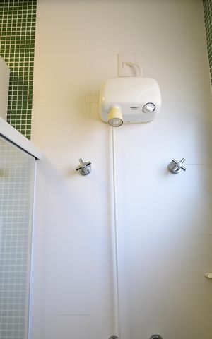 Casa de condomínio para alugar com 310m², 3 quartos e 4 vagasBanheiro Suíte