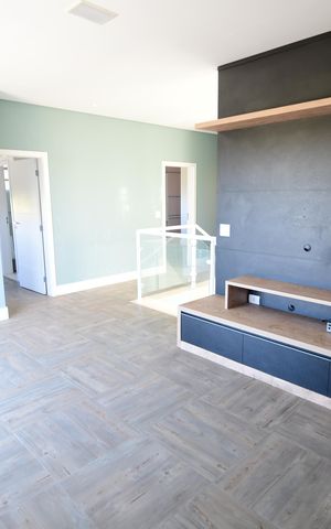 Casa de condomínio para alugar com 310m², 3 quartos e 4 vagasSala de TV