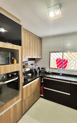 Casa à venda com 150m², 3 quartos e 2 vagas Casa à venda com 150m², 3 quartos e 2 vagasCozinha