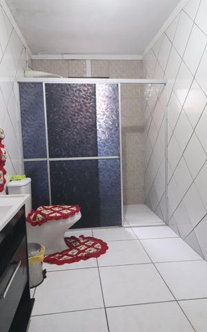 Casa à venda com 186m², 2 quartos e 2 vagasBanheiro