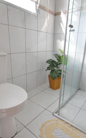 Casa à venda com 255m², 4 quartos e 3 vagasBanheiro 1