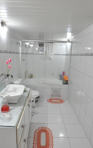 Casa à venda com 255m², 4 quartos e 3 vagasBanheiro do Quarto Suíte