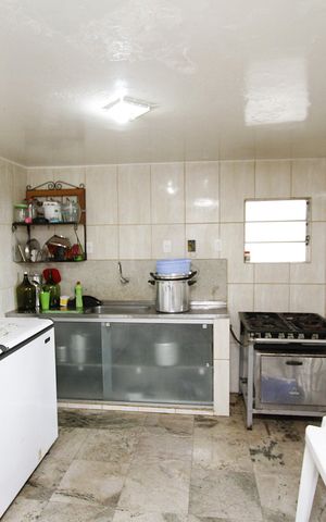 Casa à venda com 400m², 3 quartos e 2 vagasCozinha AREA EXTERNA