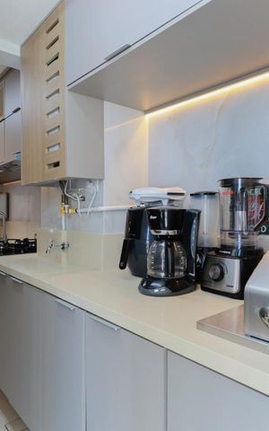 Apartamento à venda com 43m², 2 quartos e 1 vaga Apartamento à venda com 43m², 2 quartos e 1 vagaCozinha e área de serviço